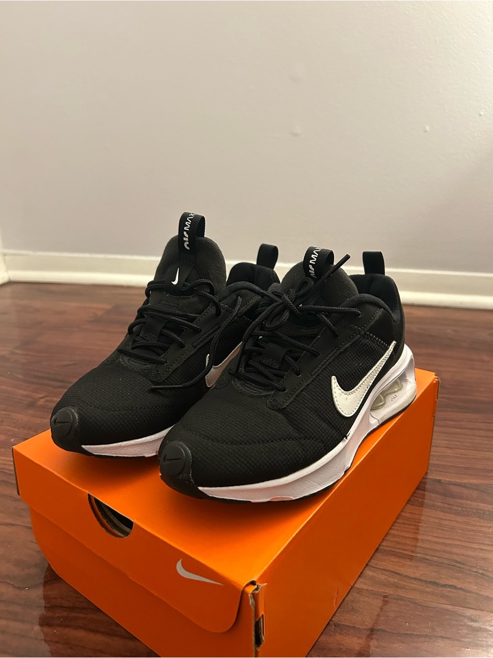 Nike Black And White Athletic Sneakers With Treaded Soles View 3